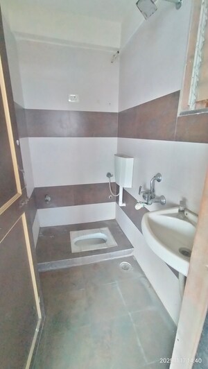 Bathroom in 1 BHK Apartment at Rudis Sunanda Circle, Shilphata – for Sale