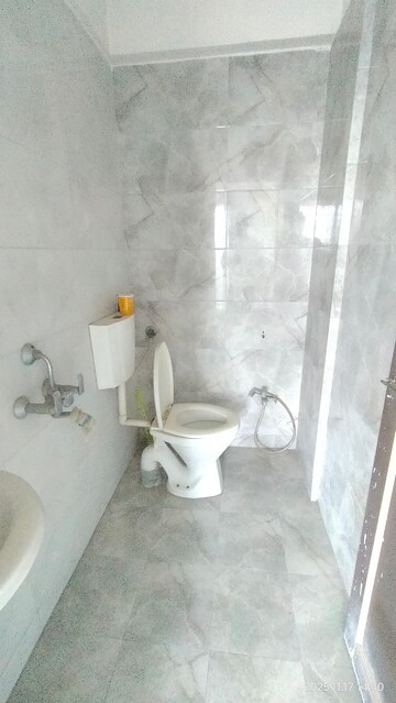 Bathroom in 1 BHK Apartment at Rudis Sunanda Circle, Shilphata – for Sale