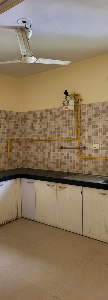 Kitchen in 3 BHK Apartment at Amli Ind Estate – for Sale