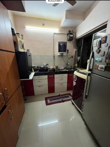 Kitchen in 2 BHK Apartment at Runwal Garden City, Balkum Pada – for Rent