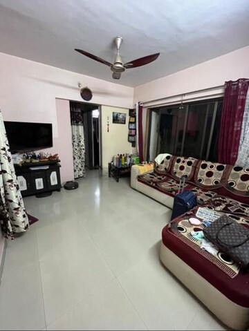 Living Room in 2 BHK Apartment at Runwal Garden City, Balkum Pada – for Rent