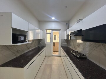 Kitchen in 3.5 BHK Apartment at ACE Parkway, Sector 150 – for Rent
