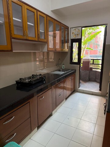 Kitchen in 2 BHK Apartment at Unitech Palms, South City 1 – for Rent