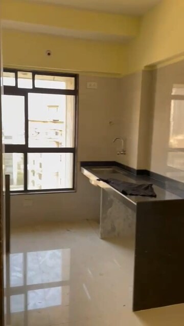 Kitchen in 3 BHK Apartment at New India Grace Luxuria, Malad West – for Rent