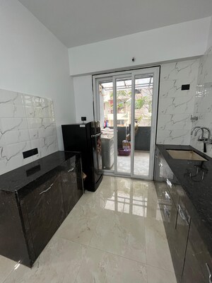 Kitchen in 2 BHK Apartment at LMS Finswell Woods, Viman Nagar – for Rent