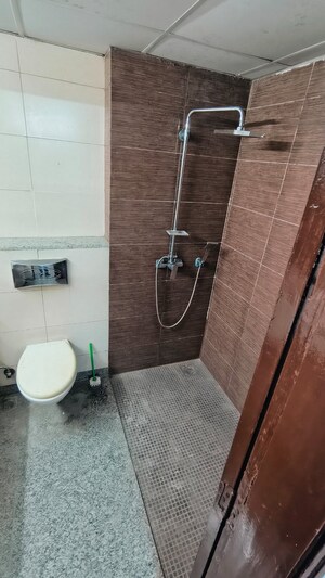 Bathroom in 3 BHK Apartment at Raheja Vedaanta, Sector 108 – for Rent