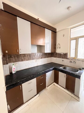 Kitchen in 3 BHK Apartment at Radicon Vedantam, Sector 16c Greater Noida – for Rent