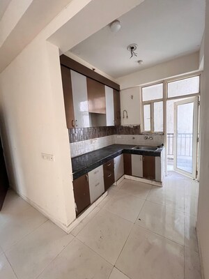 Kitchen in 3 BHK Apartment at Radicon Vedantam, Sector 16c Greater Noida – for Rent
