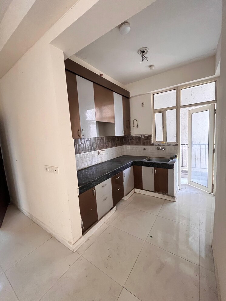 Kitchen, radicon-vedantam 3 Bedroom 1375 Sq.Ft. Apartment In Sector 16c Greater Noida Greater Noida 9472157