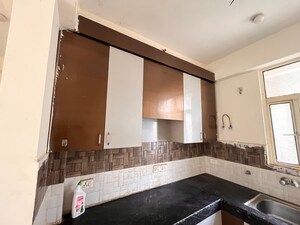 Kitchen in 3 BHK Apartment at Radicon Vedantam, Sector 16c Greater Noida – for Rent