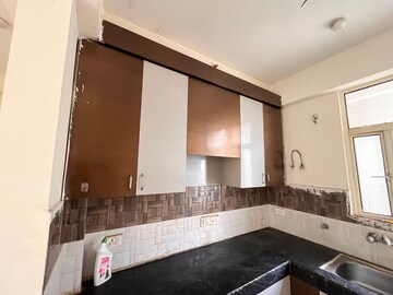 Kitchen in 3 BHK Apartment at Radicon Vedantam, Sector 16c Greater Noida – for Rent