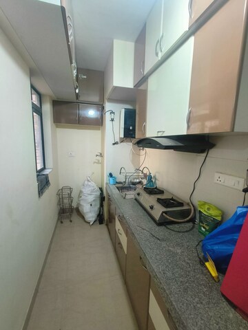 Kitchen in 1 BHK Apartment at Lodha Palava Crown, Dombivli East – for Rent