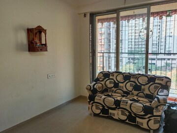 Living Room in 1 BHK Apartment at Bharat Pearl Oster, Ulwe – for Rent