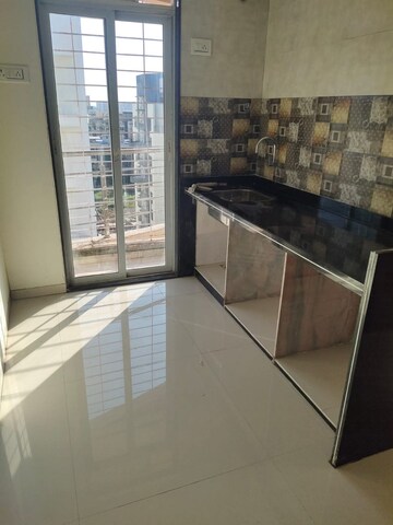 Kitchen in 1 BHK Apartment at Gurukrupa Aramus Complex, Ulwe – for Rent