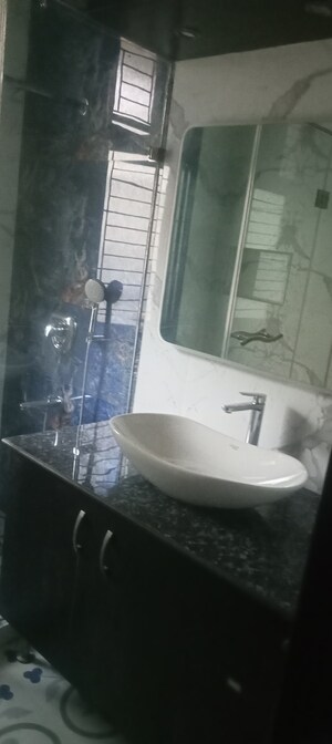 Bathroom in 4 BHK Builder Floor at Safdarjung Development Area – for Rent