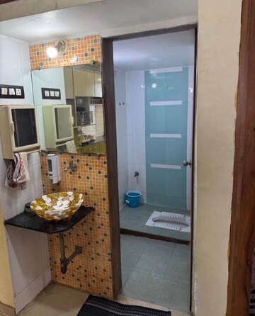 Bathroom in 1.5 BHK Apartment at Chheda Enclave, Mira Road – for Rent