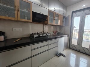 Kitchen in 2 BHK Apartment at Hiranandani Estate, Ghodbunder Road – for Rent