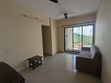 Living Room in 1.5 BHK Apartment at Shree Satya Shankar Residency, Manpada – for Rent