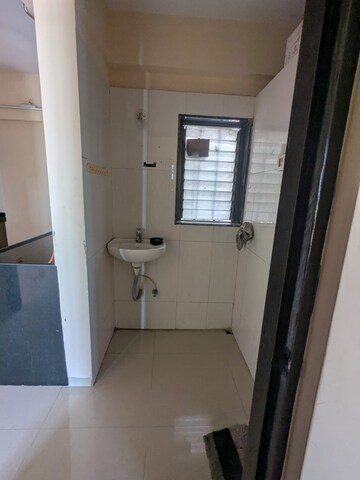 Kitchen in 1.5 BHK Apartment at Shree Satya Shankar Residency, Manpada – for Rent