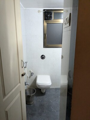 Bathroom in 3 BHK Apartment at Shree Satya Shankar Residency, Manpada – for Rent