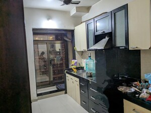 Kitchen in 3 BHK Apartment at Shree Satya Shankar Residency, Manpada – for Rent