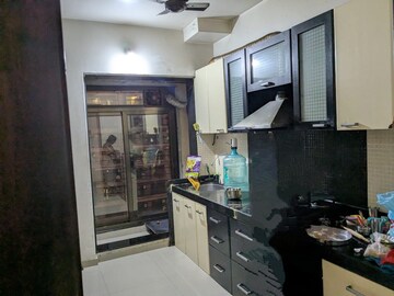 Kitchen in 3 BHK Apartment at Shree Satya Shankar Residency, Manpada – for Rent
