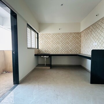 Kitchen in 2 BHK Apartment at Nirmal Krushnai Kunj, Vadgaon Budruk – for Sale