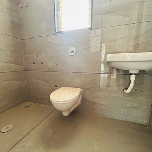 Bathroom in 2 BHK Apartment at Nirmal Krushnai Kunj, Vadgaon Budruk – for Sale