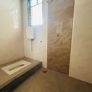 Bathroom in 2 BHK Apartment at Nirmal Krushnai Kunj, Vadgaon Budruk – for Sale