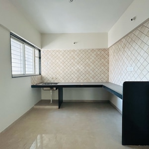 Kitchen in 2 BHK Apartment at Nirmal Krushnai Kunj, Vadgaon Budruk – for Sale