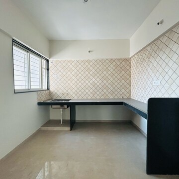 Kitchen in 2 BHK Apartment at Nirmal Krushnai Kunj, Vadgaon Budruk – for Sale