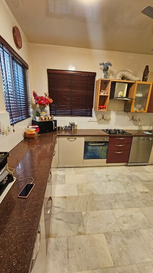 Kitchen in 4 BHK Apartment at Ratna Avenue, Richmond Road – for Rent
