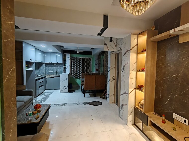 Living Room, sunshine-enclave-new-town 2 Bedroom 981 Sq.Ft. Apartment In New Town Kolkata 9473144