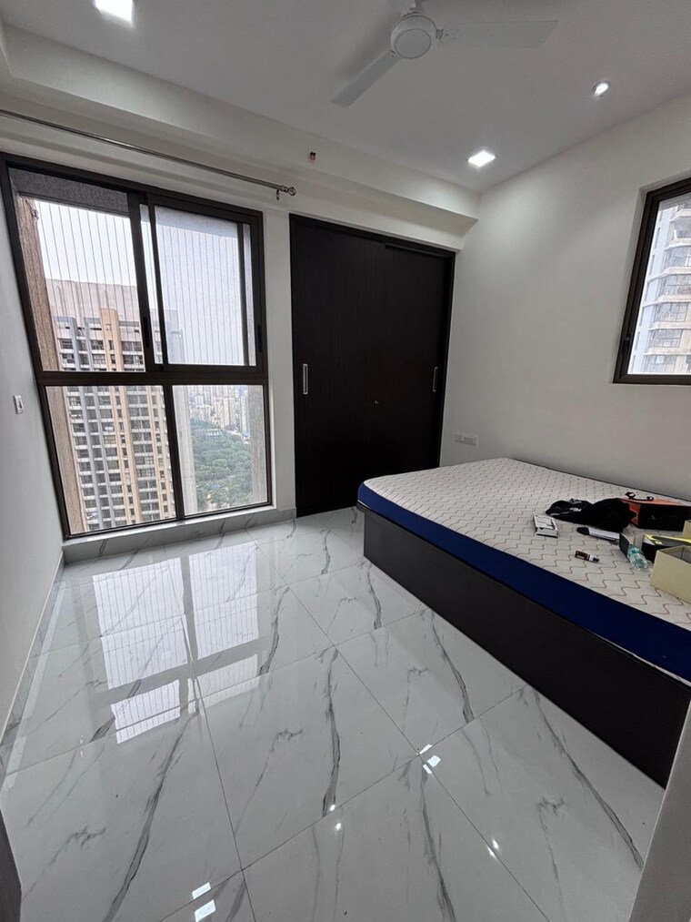 Bedroom, raymond-ten-x-habitat 2 Bedroom 635 Sq.Ft. Apartment In Pokhran Road No Two Thane 9473236