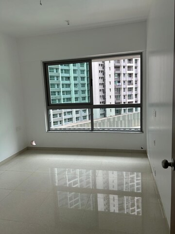 Room in 2 BHK Apartment at Kalpataru Immensa, Kolshet Road – for Sale