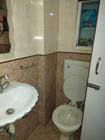 Bathroom in 2 BHK Apartment at Abrol Krishna Vastu 1 2, Malad West – for Rent