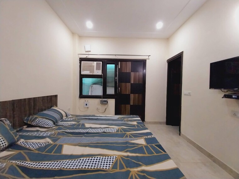 Bedroom, dlf-city-phase-v 1.5 Bedroom 550 Sq.Ft. Apartment In Dlf Phase V Gurgaon 9473476