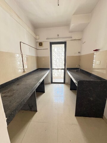 Kitchen in 2 BHK Apartment at Lodha Lakeshore Greens, Dombivli East – for Sale