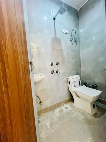 Bathroom in 2 BHK Builder Floor at Dwarka Mor – for Rent