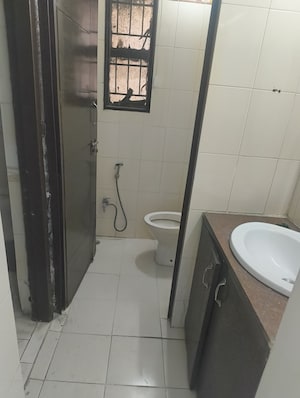 Bathroom in 4 BHK Apartment at Vasant Kunj – for Sale