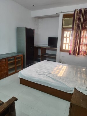 Bedroom in Studio Independent House at RWA Apartments Sector 30, Sector 30 – for Rent