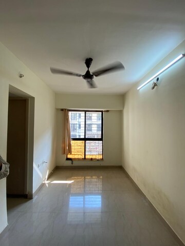 Living Room in 1 BHK Apartment at Lodha Golden Dream, Dombivli East – for Rent