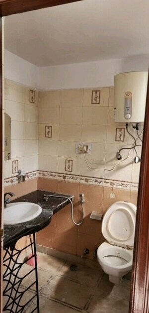 Bathroom in 3 BHK Apartment at Mass Apartment, Sector 10 Dwarka – for Rent