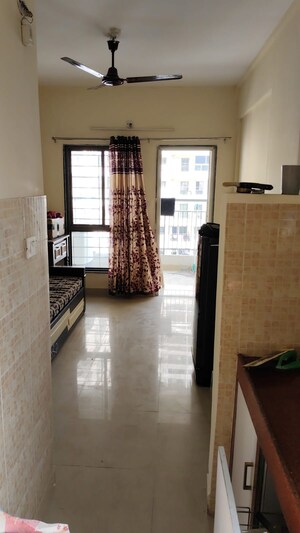 Living Room in 1 BHK Apartment at Golf Green Apartments, Sector 19 Dwarka – for Rent