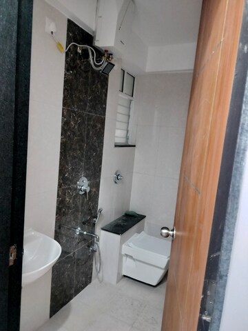 Bathroom in 2 BHK Apartment at NG Vrundavan, Vishrantwadi – for Rent