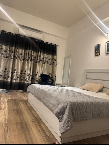 Bedroom in 1 BHK Apartment at Paramount Golfforeste, Zeta I Greater Noida – for Rent