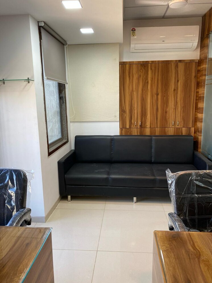 Living Room, binori-b-square-3 Commercial Office Space 865 Sq.Ft. In Bodakdev Ahmedabad 9474078