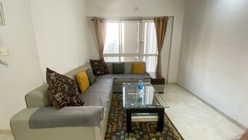Living Room in 2 BHK Apartment at Lodha Amara, Kolshet Road – for Sale