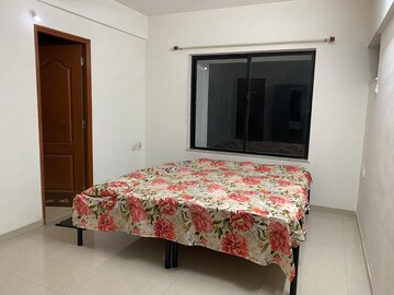 Bedroom in 2 BHK Apartment at Ganga Sarovar, Wadgaon Sheri – for Rent