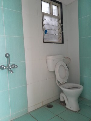 Bathroom in 2 BHK Apartment at Ram India Green Divine, Hadapsar – for Rent